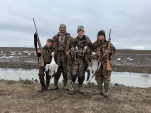 family duck hunting picture with RGO